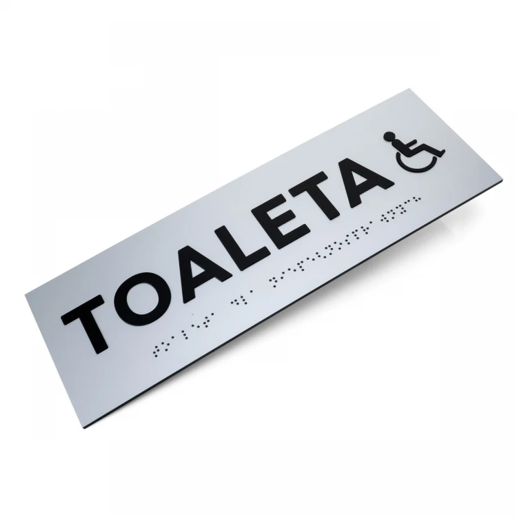 Tabliczka z wypukłymi literami i pismem Braille'a - Toaleta dla niepełnosprawnych - laminat srebrny - wym. 295x100mm - TAB506
