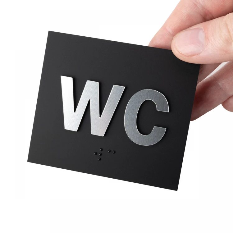 WC - tabliczka z pismem Braille'a - akryl czarny mat i laminat srebrny - wym. 80x70mm - TAB489